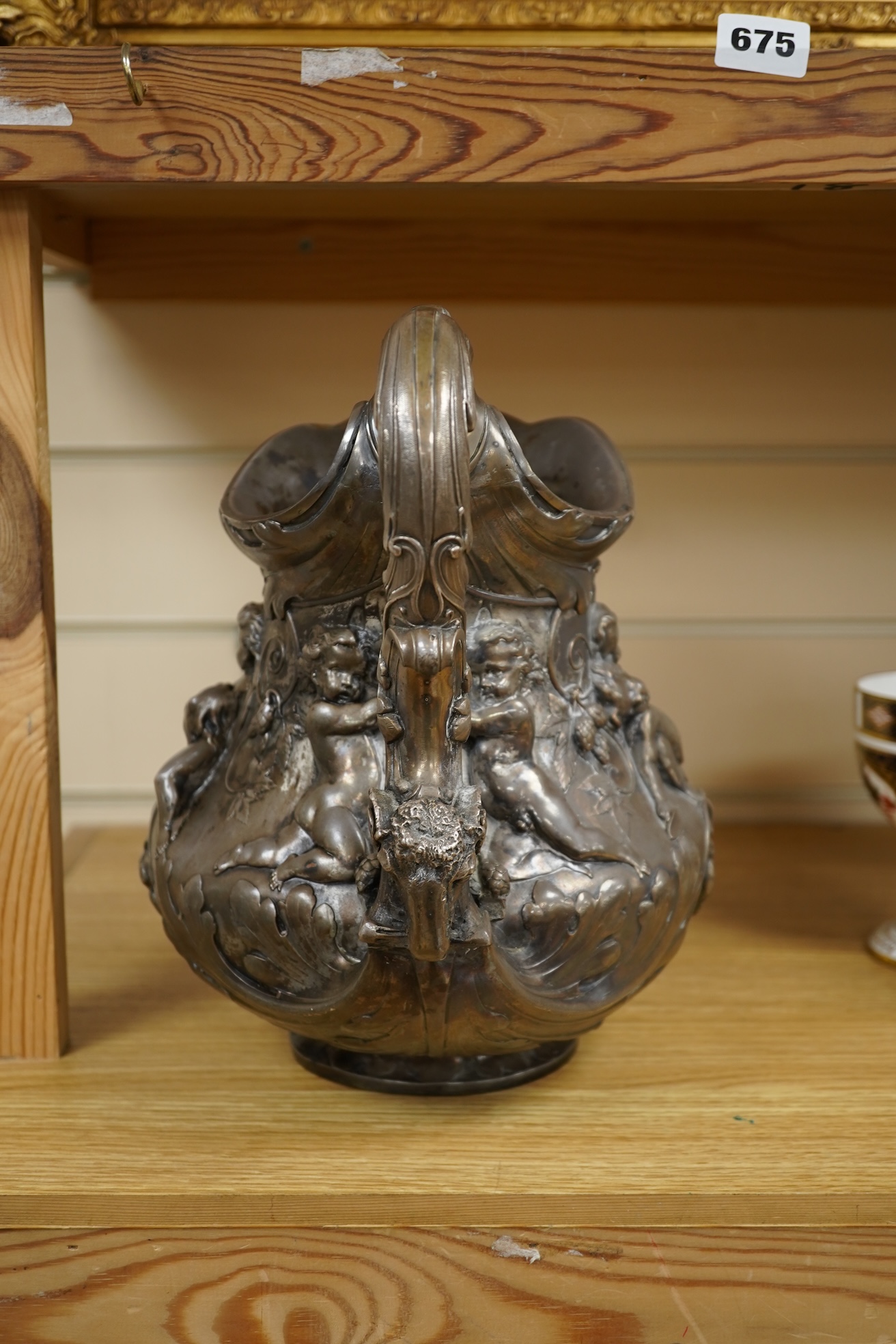 A large Victorian electrotype silver plated jug, in the manner of Elkington & Co., 28cm